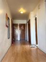 Corridor with wood finished floors