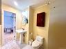Full  bath with tile patterned floors and ornamental molding
