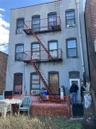 Rear view of property featuring stucco siding