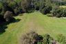 Aerial overview of property's location with a forest