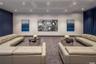 Cinema room featuring recessed lighting and carpet flooring