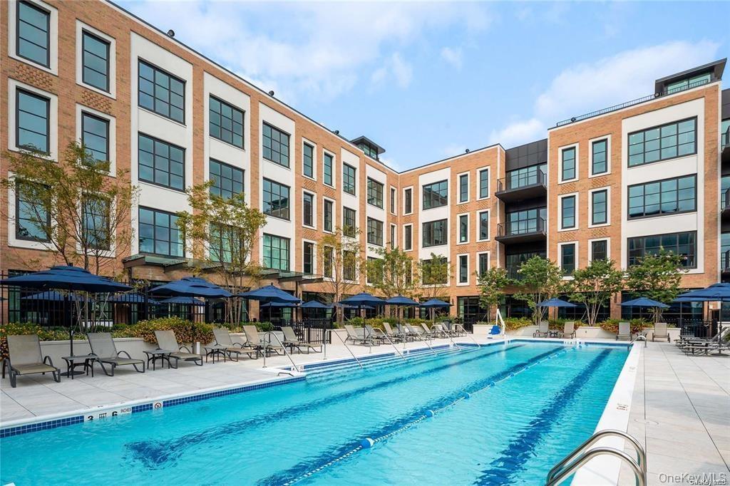 Community pool featuring a patio area