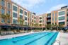Community pool featuring a patio area
