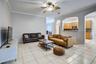 Spacious family room & open counter top area to kitchen