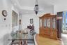 Dining room with light wood finished floors and recessed lighting