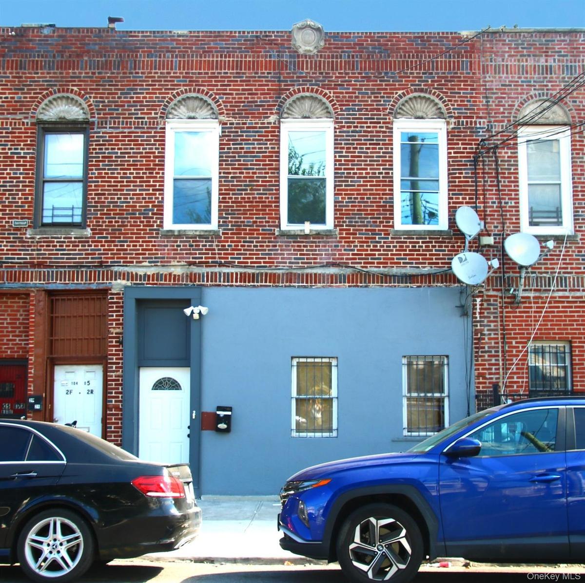 View of front of property with brick siding