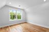 Bonus room with vaulted ceiling, baseboards, light wood-style floors, and recessed lighting