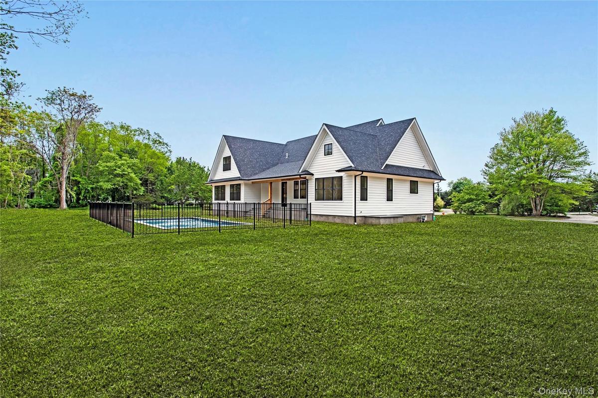expansive property of nearly a full acre!