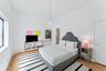 Bedroom with light wood finished floors