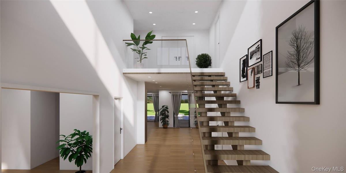 Staircase with a high ceiling, wood finished floors, and recessed lighting