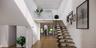 Staircase with a high ceiling, wood finished floors, and recessed lighting