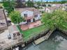 Aerial view of residential area with a nearby body of water
