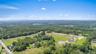 Drone / aerial view of a heavily wooded area