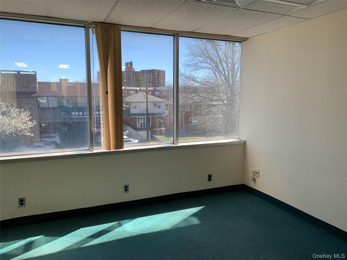 Unfurnished room featuring a paneled ceiling