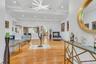 Entryway featuring a baseboard heating unit, ornamental molding, light wood finished floors, recessed lighting, and baseboard heating