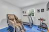 Workout area featuring baseboards
