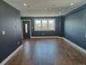 Entrance foyer featuring dark wood-style flooring and recessed lighting