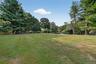 View of yard with view of scattered trees