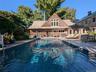 Swimming pool with a patio area