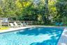 Outdoor pool with a patio area