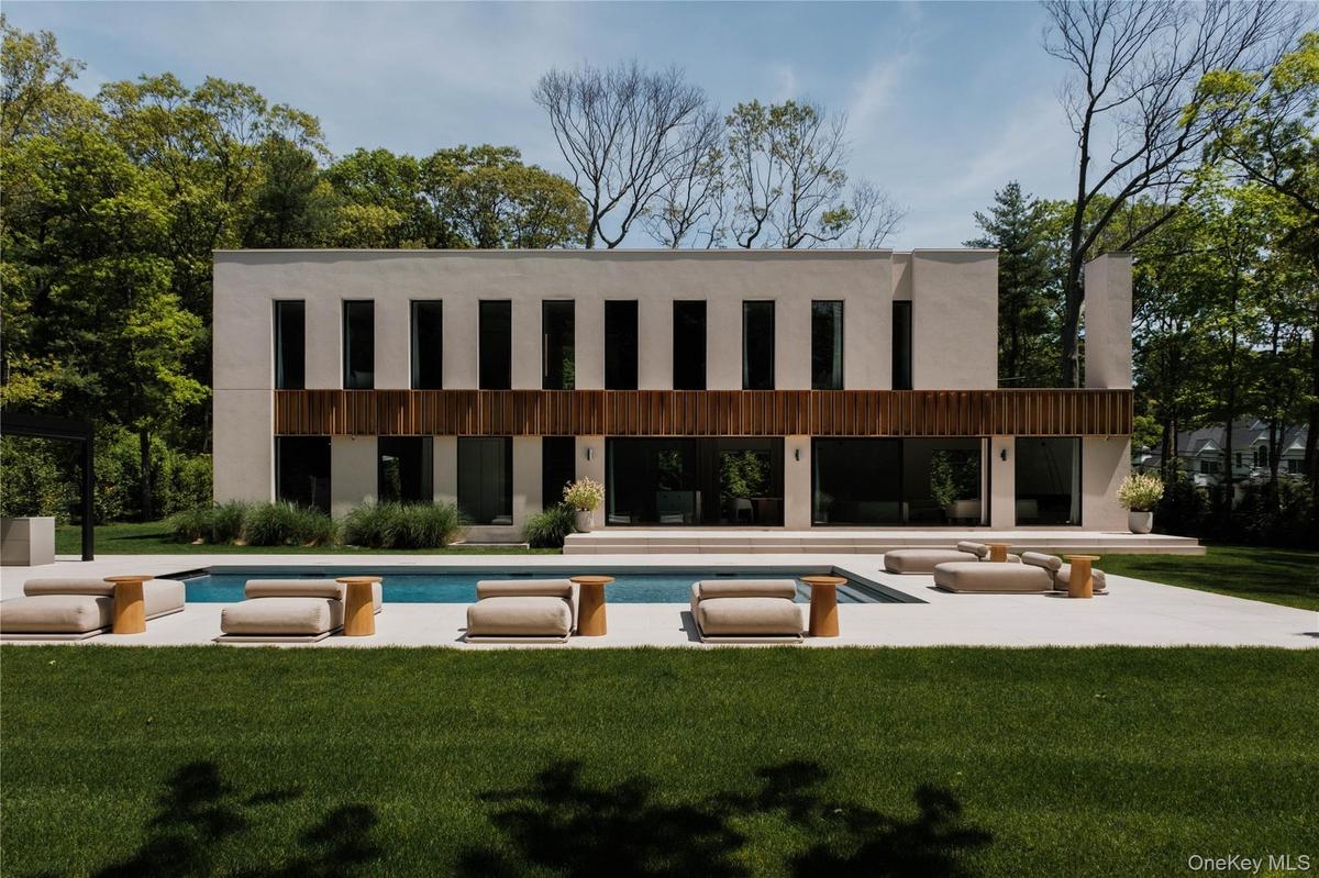 Stunning view of the rear property. Gorgeous Inground Gunite Pool. Inground Gunite Pool.