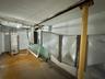 Unfinished below grade area with water heater