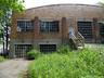 Back of building featuring brick siding