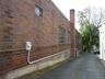 Side of building with new electrical service
