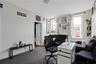 Carpeted office featuring healthy amount of natural light