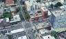 Aerial view of property and surrounding area with property parcel outlined