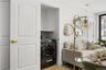 Laundry room featuring washer / dryer, laundry area, and light wood finished floors