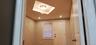Detailed view of recessed lighting and a skylight