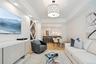 Living room with light hardwood / wood-style floors