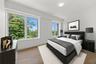 Bedroom featuring light wood-type flooring and baseboards