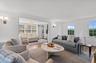 Living area featuring wood finished floors and baseboards