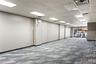 Below grade area featuring carpet and a paneled ceiling