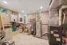 Utilities with water heater and electric panel
