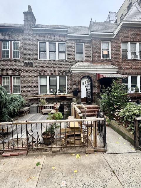 View of front facade with brick siding