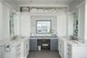 Bathroom featuring ornamental molding, sink, tile patterned flooring, and tasteful backsplash