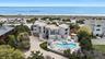Bird's eye view with a water view and a view of the beach
