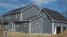 View of side of home with a garage