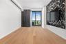 Unfurnished room featuring baseboards and wood finished floors