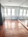 Empty room featuring baseboards
