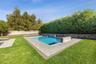 View of swimming pool featuring a patio and a fenced backyard