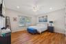 Bedroom featuring light wood finished floors, recessed lighting, and ceiling fan
