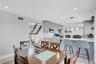 Dining space featuring stairs, recessed lighting, and light wood-style flooring