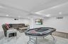 Game room featuring baseboards and recessed lighting