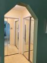 Corridor featuring carpet