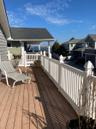 Wooden deck featuring a residential view