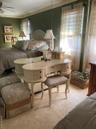 Bedroom featuring carpet flooring and crown molding